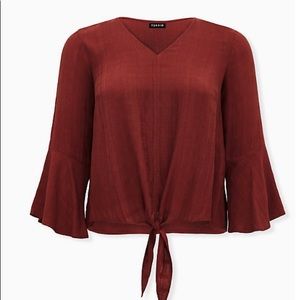 Brick red textured tie front midi blouse